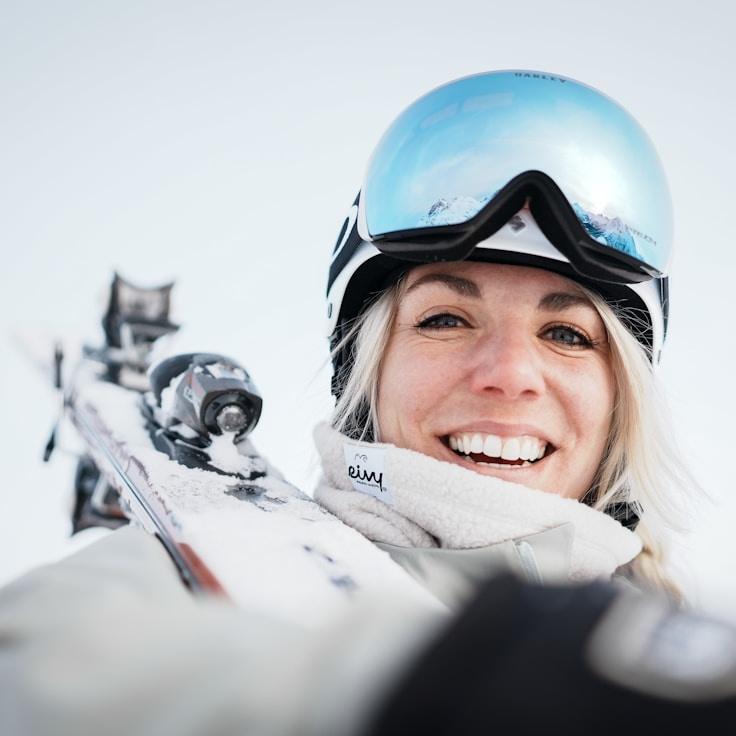 Ari Patel, Lead Design Curator at Nova Plexoria, reviewing corporate floral arrangements